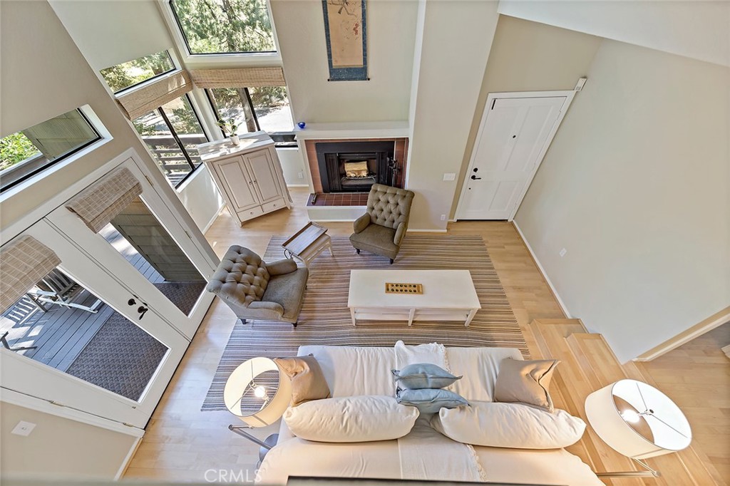 612 Karenken Pines Drive Lake Arrowhead, CA 92391 - Photo 8 of 44 a view of living room with furniture and fireplace