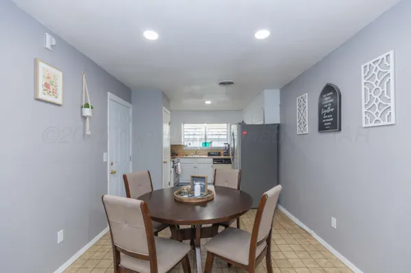 a view of a dining room with furniture