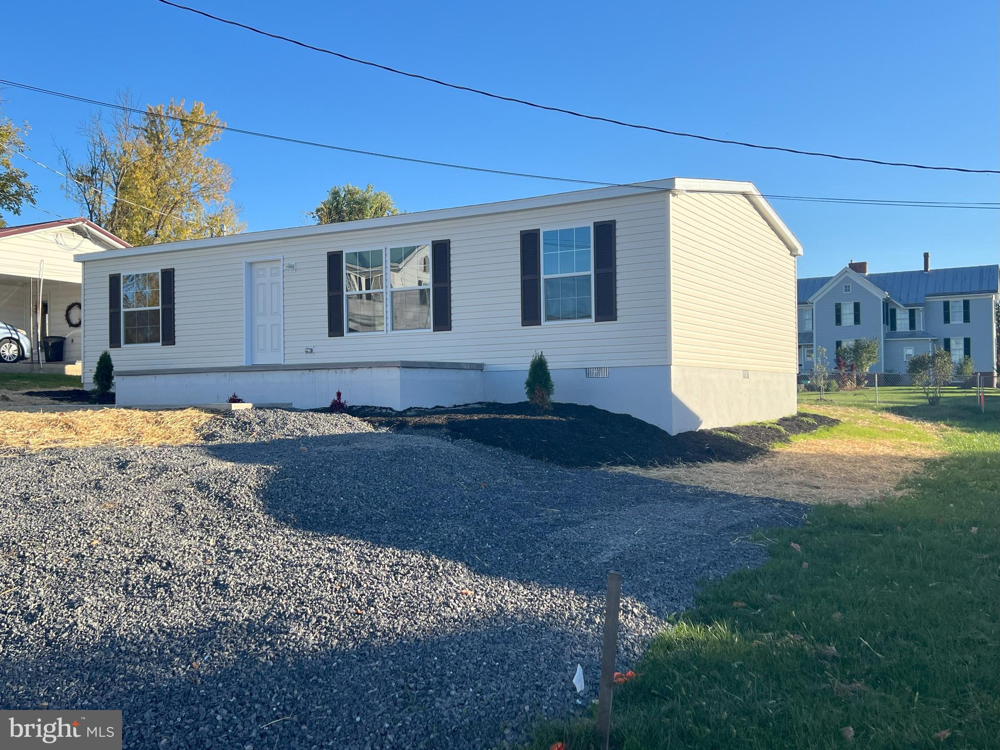 211 Eisenhower Road Moorefield, WV 26836 - Photo 1 of 17 a view of a house with a yard