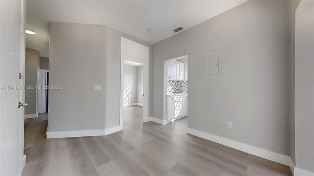 an empty room with windows