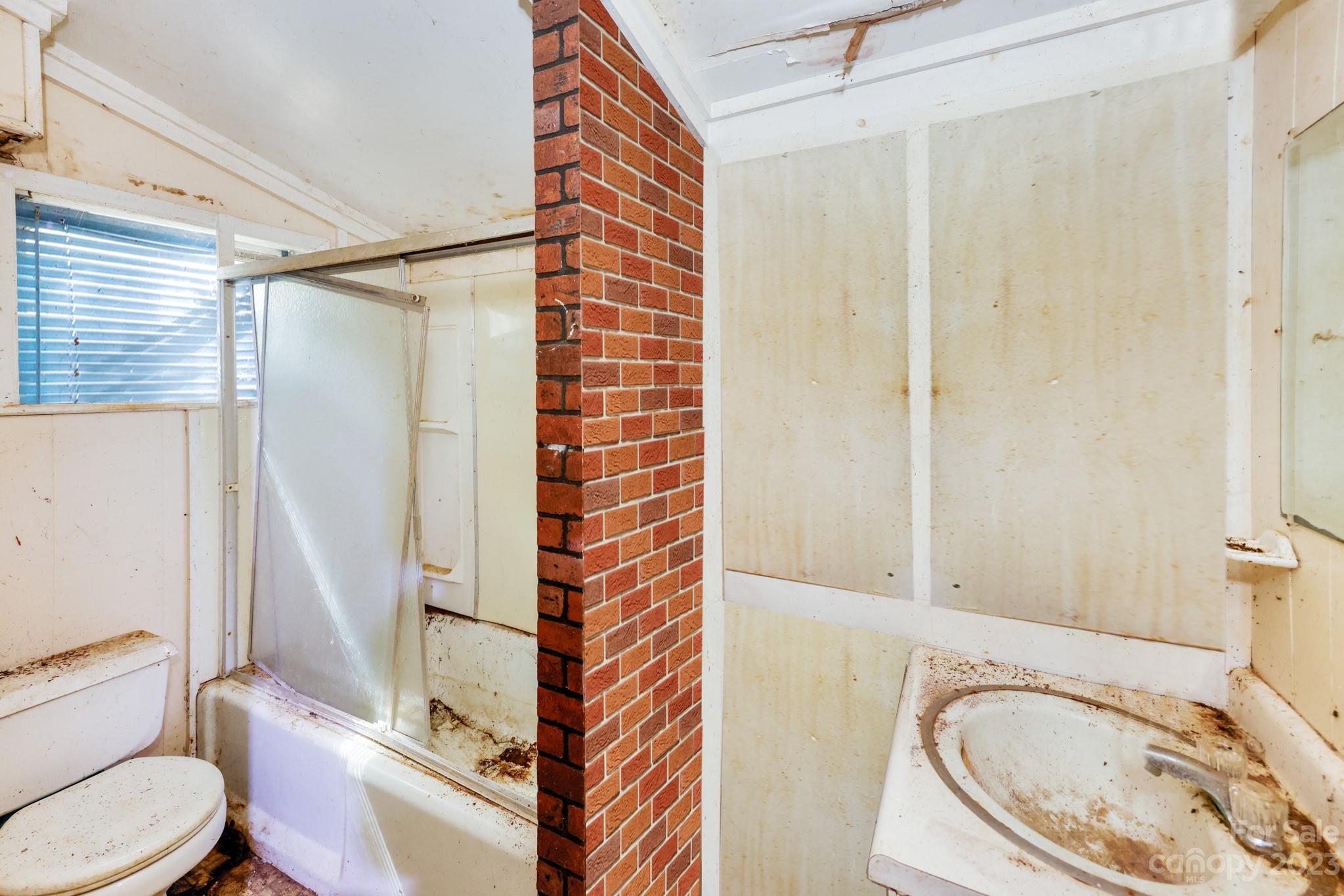 158 Pine Street Rutherfordton, NC 28139 - Photo 13 of 37 a bathroom with a sink and toilet