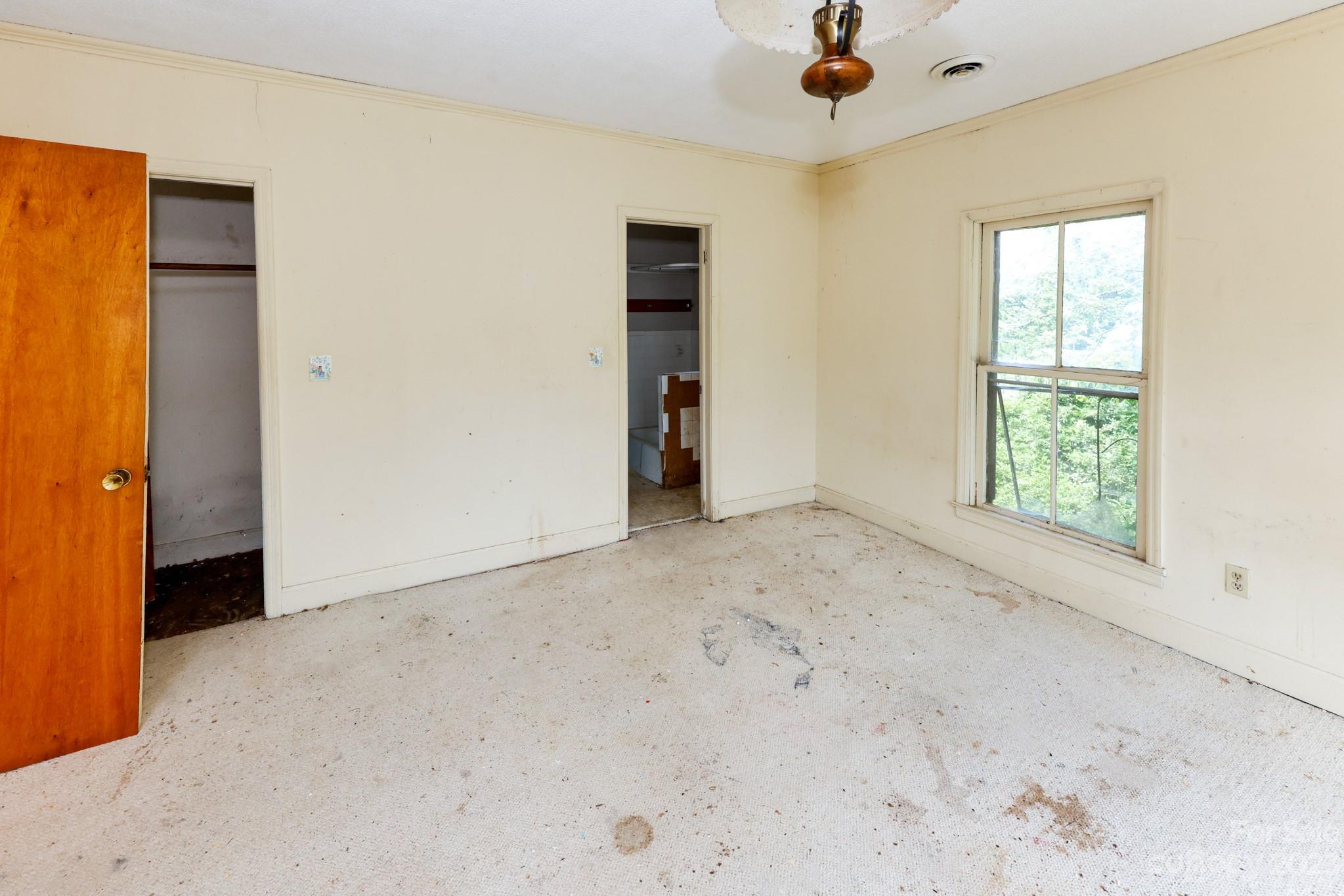 158 Pine Street Rutherfordton, NC 28139 - Photo 18 of 37 an empty room with windows