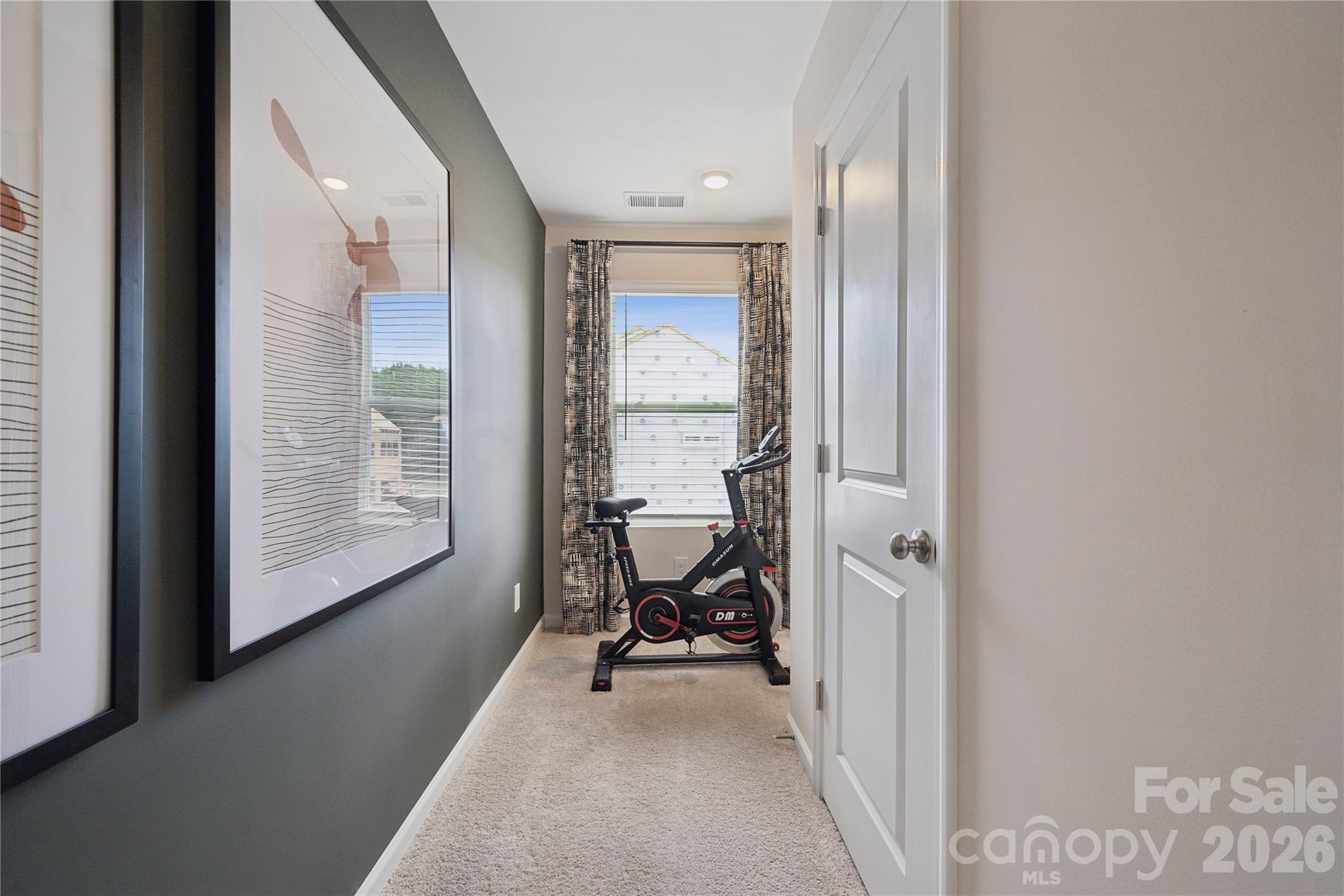 5857 Tuckaseegee Road, Unit 4 Charlotte, NC 28208 - Photo 18 of 23 a view of a room with a lounge chair and windows