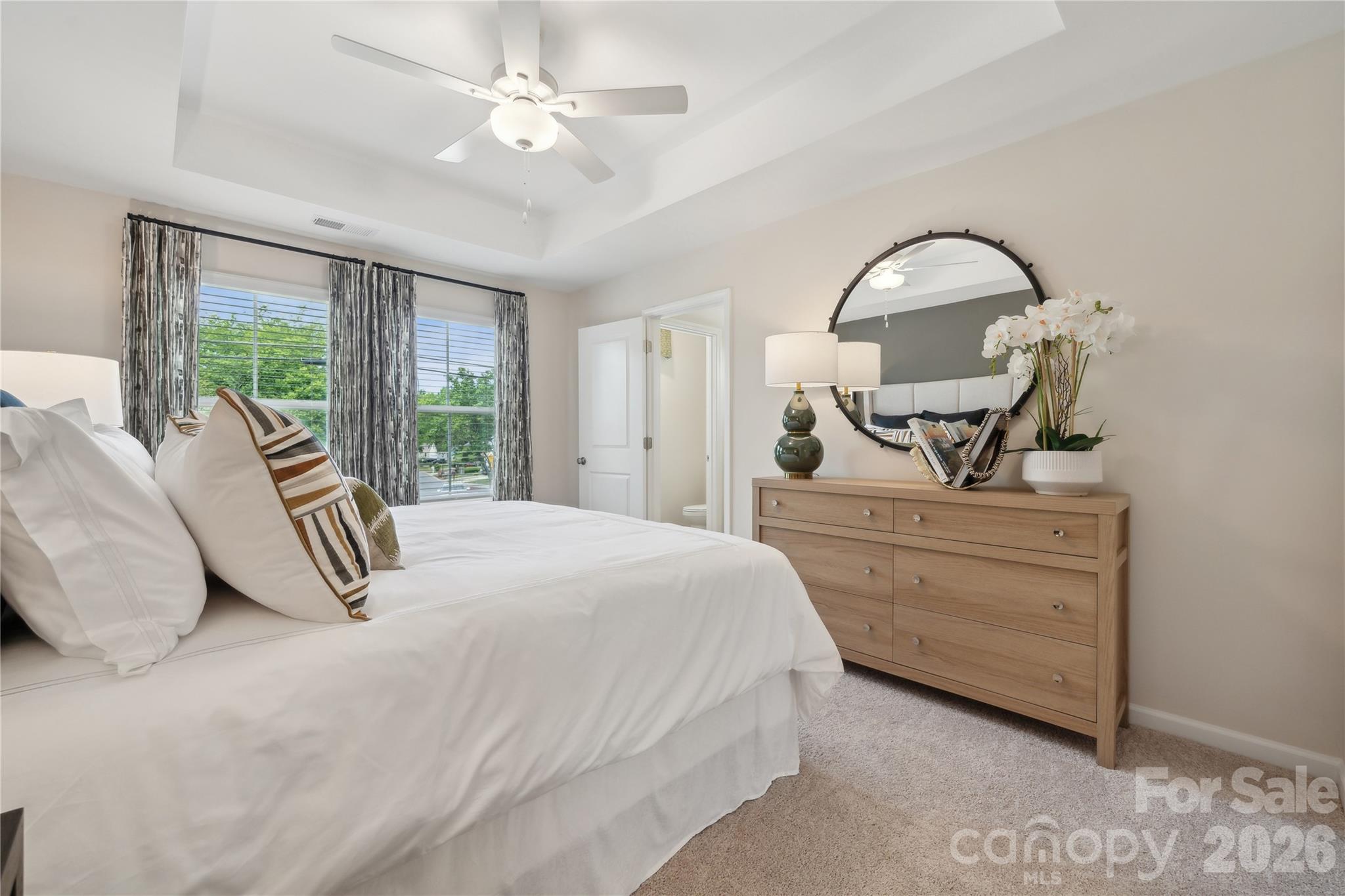 5857 Tuckaseegee Road, Unit 4 Charlotte, NC 28208 - Photo 21 of 23 a bedroom with bed and window