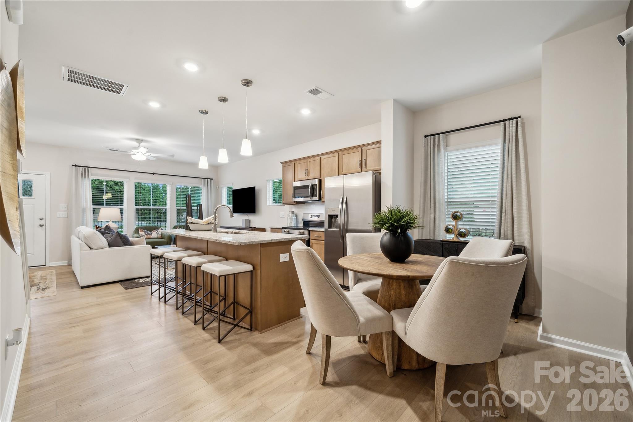 5857 Tuckaseegee Road, Unit 4 Charlotte, NC 28208 - Photo 4 of 23 a living room with furniture and a large window