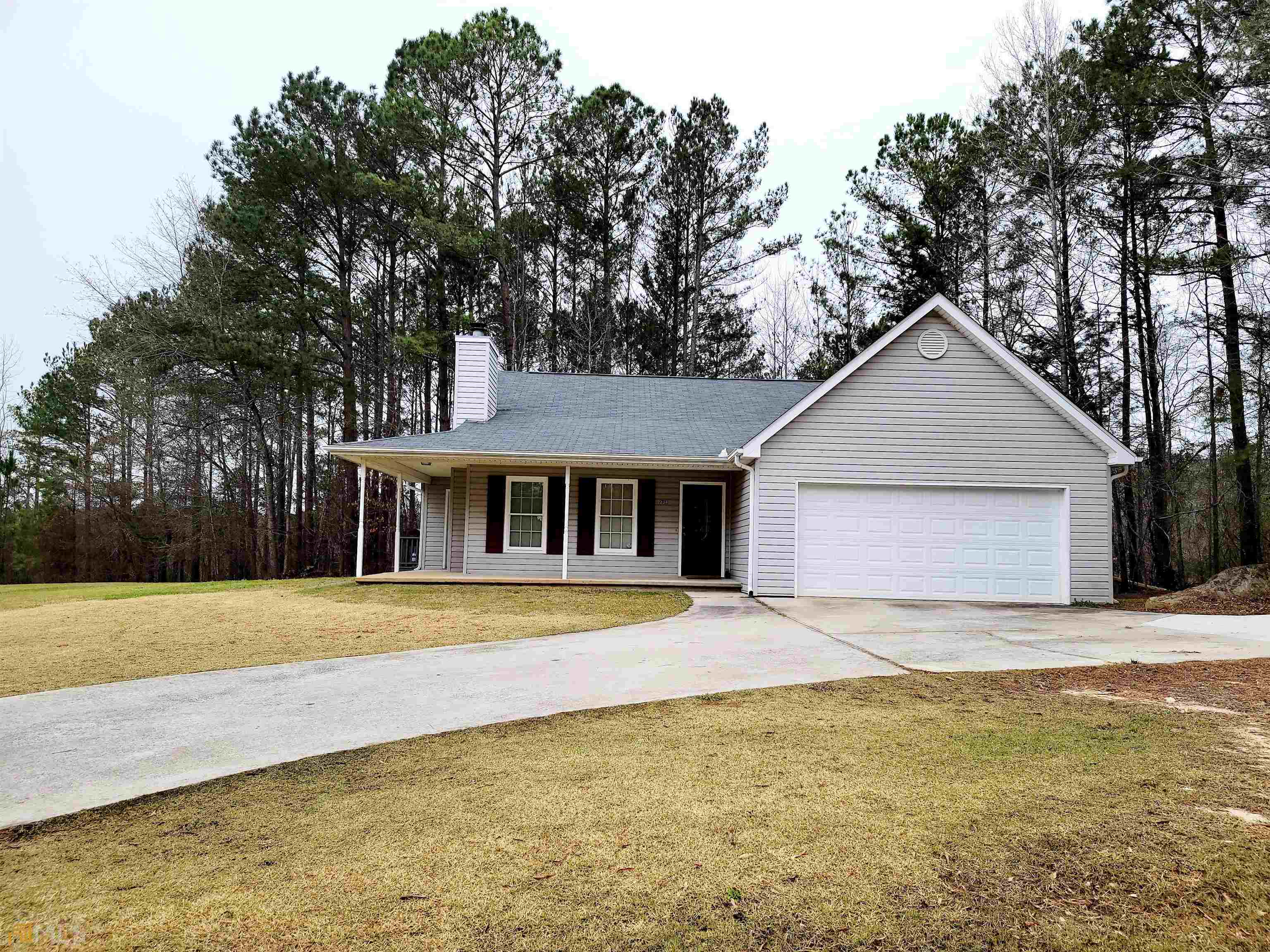 238 Redland Road Franklin, GA 30217 - Photo 1 of 1 a front view of house with yard and trees