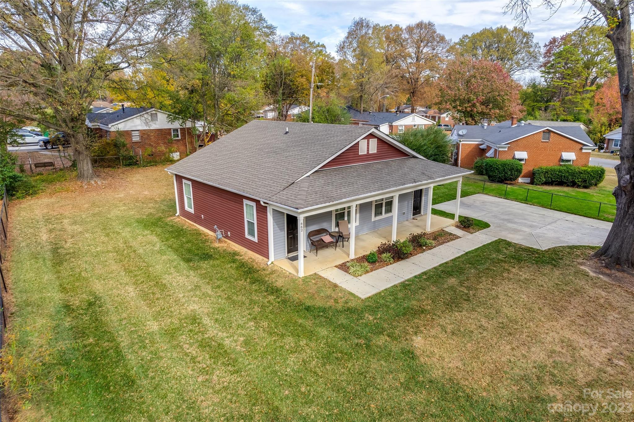 662-664 Reeves Court Charlotte, NC 28208 - Photo 10 of 12 a aerial view of residential houses with yard and trees