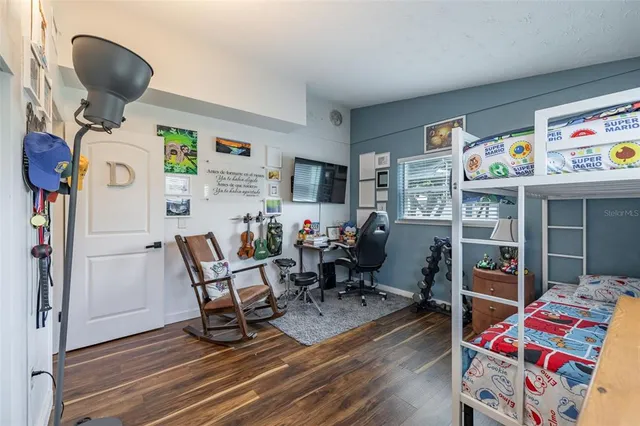 a view of storage and utility room with washer and dryer