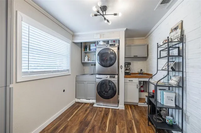 a view of a house with a yard and garden