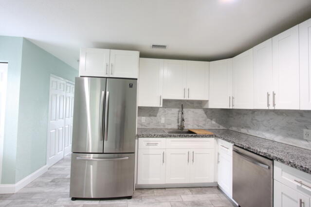 1141 Goldenrod Road, Unit 1143 Wellington, FL 33414 - Photo 15 of 36 IMG_7274