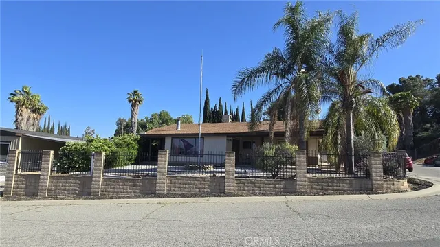 a view of a house with a swimming pool