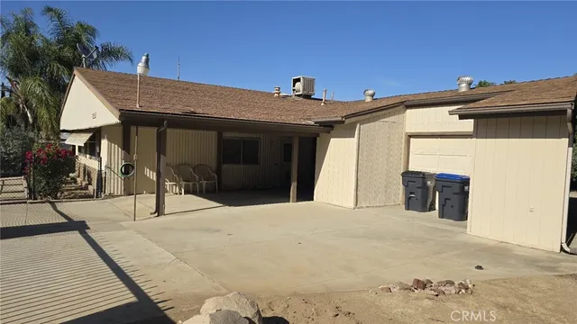 a view of a house with a flat front door