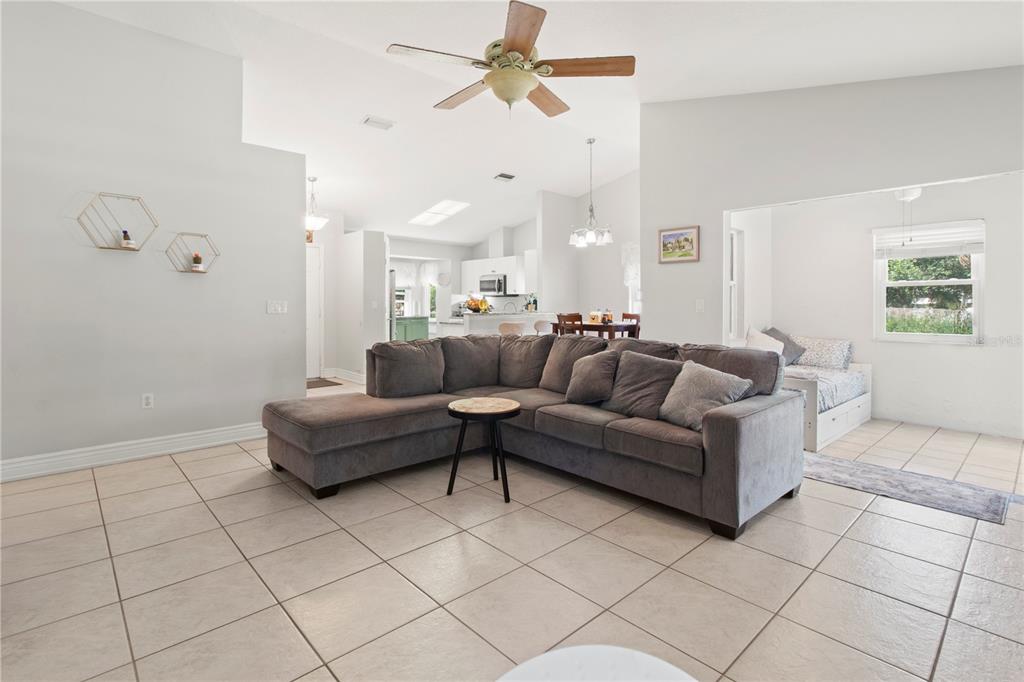 5910 Bella Road Parrish, FL 34219 - Photo 17 of 57 a living room with furniture and a rug