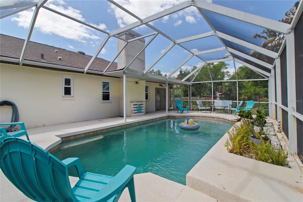 5910 Bella Road Parrish, FL 34219 - Photo 20 of 57 a view of a swimming pool with a patio