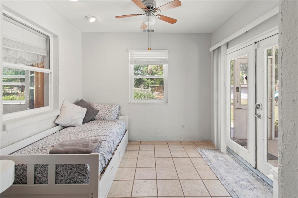 5910 Bella Road Parrish, FL 34219 - Photo 21 of 57 a bedroom with a bed and window