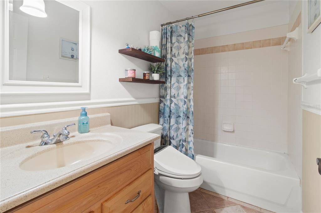 5910 Bella Road Parrish, FL 34219 - Photo 24 of 57 a bathroom with a sink a toilet and a bathtub