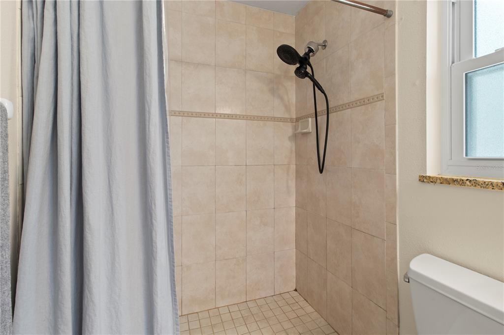 5910 Bella Road Parrish, FL 34219 - Photo 29 of 57 a bathroom with a shower