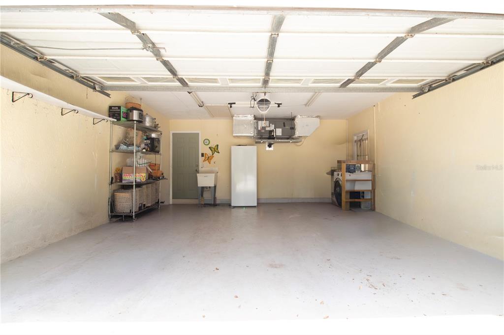 5910 Bella Road Parrish, FL 34219 - Photo 33 of 57 a view of a garage with furniture
