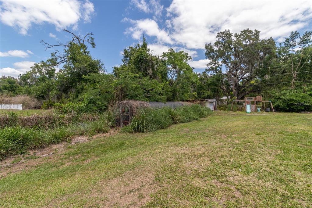 5910 Bella Road Parrish, FL 34219 - Photo 37 of 57 a big yard with lots of green space