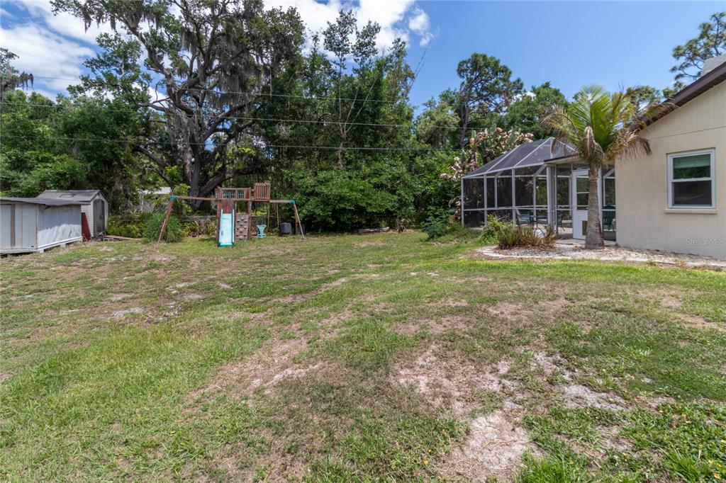 5910 Bella Road Parrish, FL 34219 - Photo 38 of 57 a front view of a house with garden