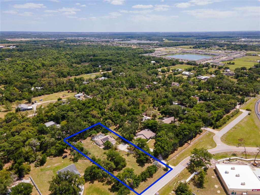 5910 Bella Road Parrish, FL 34219 - Photo 48 of 57 an aerial view of beach and residential houses with outdoor space
