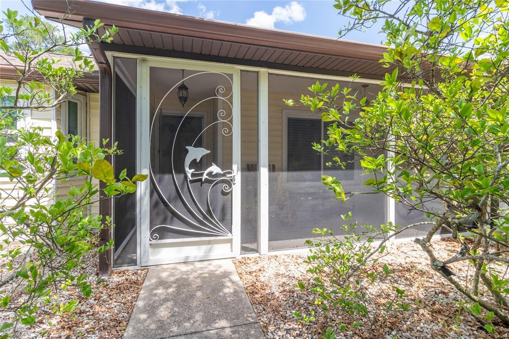 5910 Bella Road Parrish, FL 34219 - Photo 5 of 57 a view of a entryway door of the house