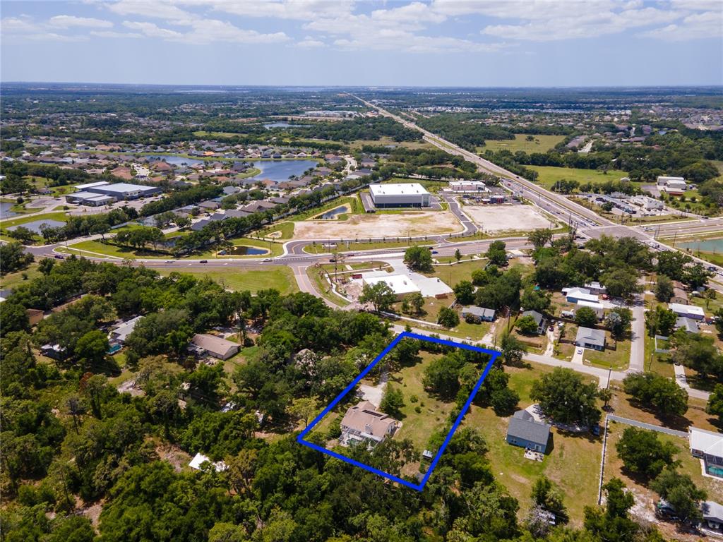 5910 Bella Road Parrish, FL 34219 - Photo 52 of 57 an aerial view of residential houses with outdoor space