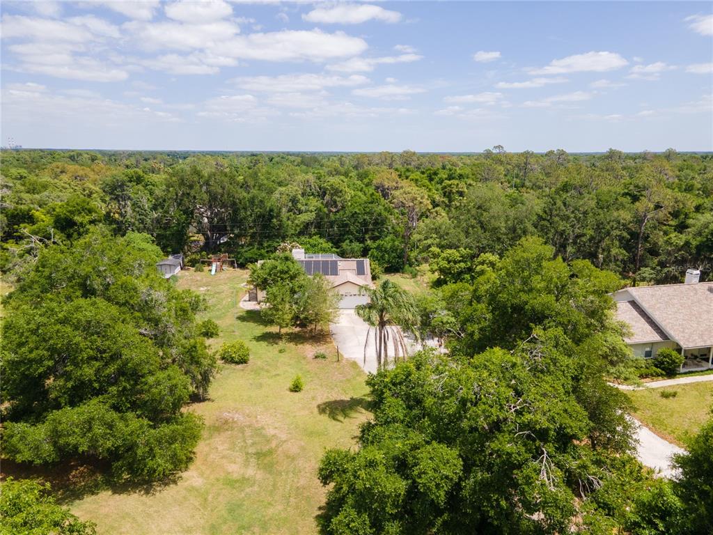 5910 Bella Road Parrish, FL 34219 - Photo 57 of 57 a view of a lake with houses