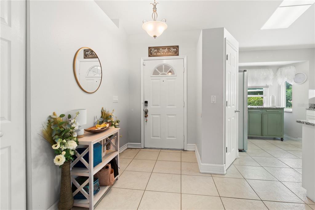5910 Bella Road Parrish, FL 34219 - Photo 8 of 57 a view of an entryway with wooden floor