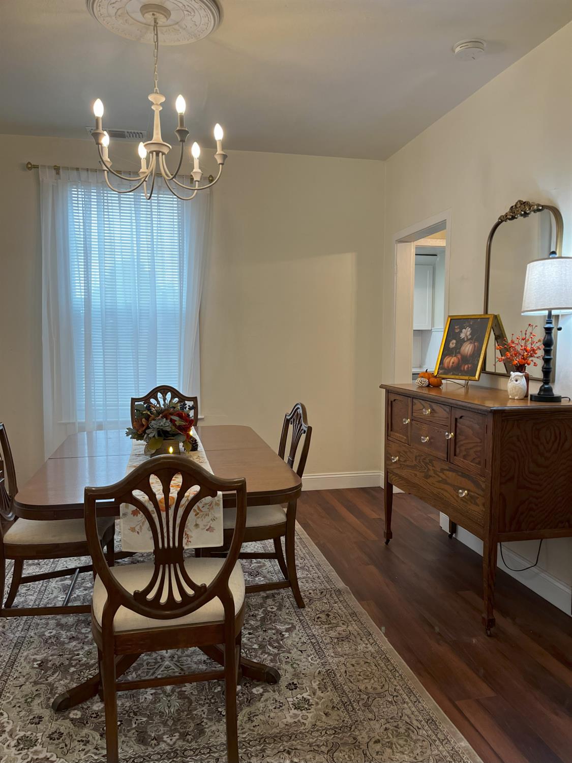 1659 Hazel Street Gridley, CA 95948 - Photo 14 of 70 a dining room with furniture and chandelier