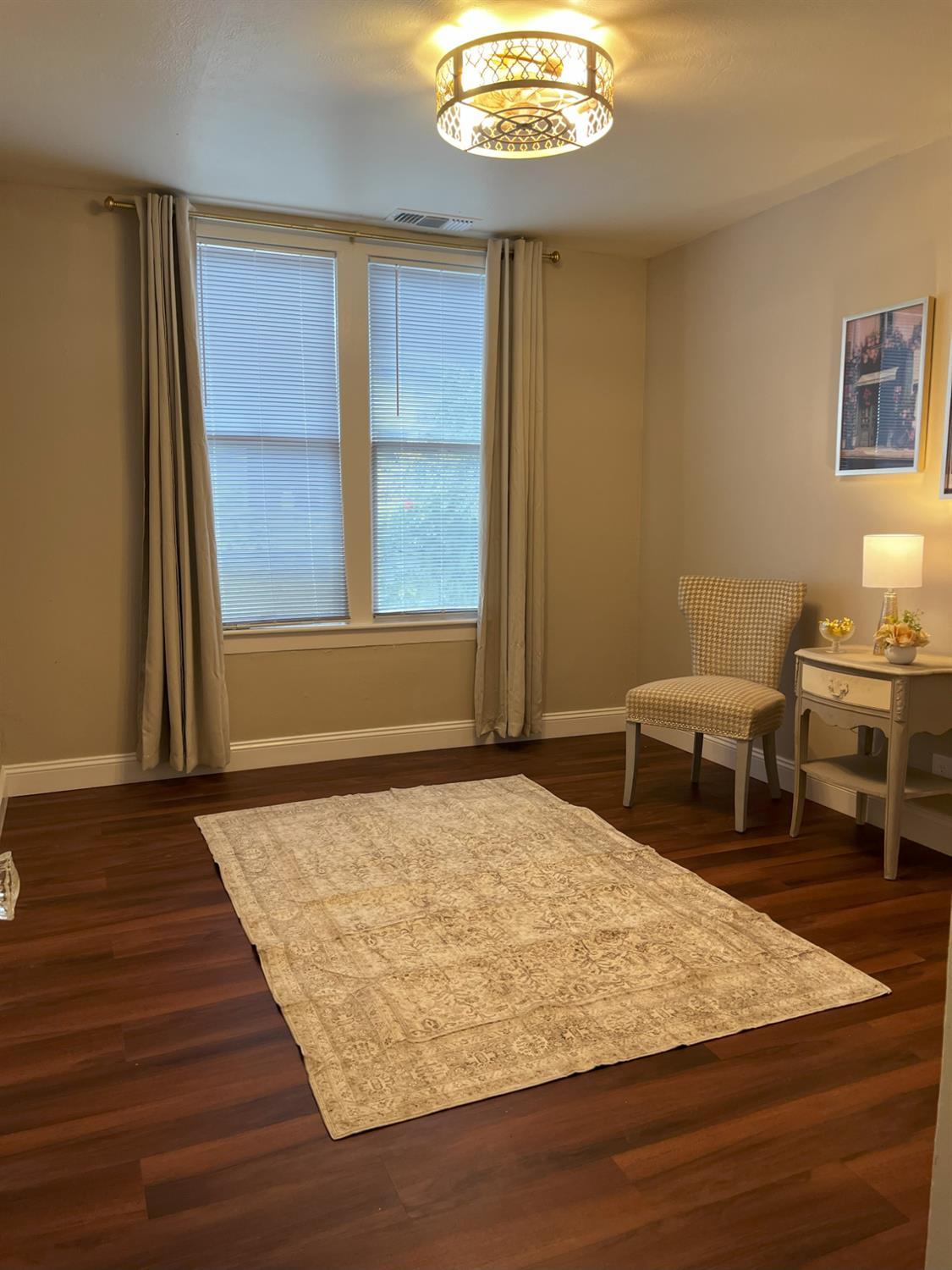 1659 Hazel Street Gridley, CA 95948 - Photo 16 of 70 a room with a bed and a table