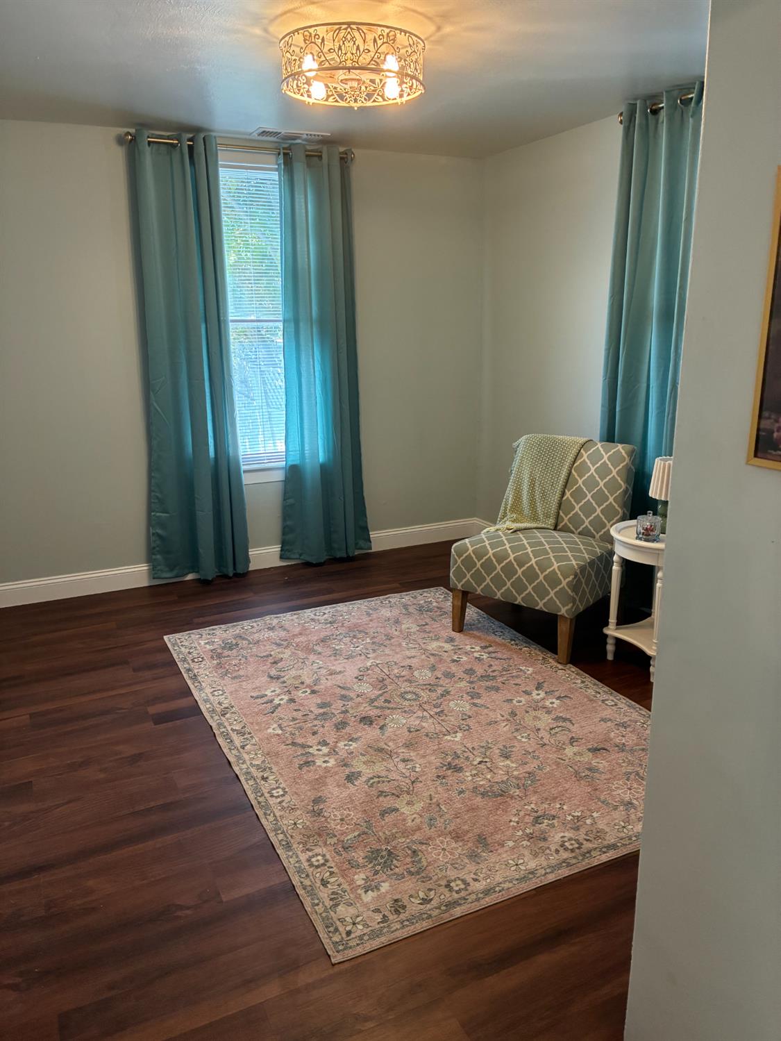 1659 Hazel Street Gridley, CA 95948 - Photo 20 of 70 a living room with furniture and a wooden floor