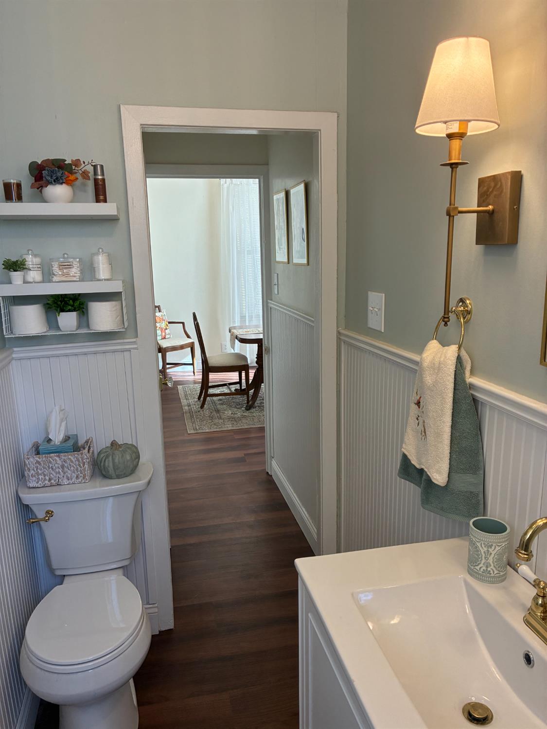 1659 Hazel Street Gridley, CA 95948 - Photo 32 of 70 a bathroom with a toilet a sink and a mirror