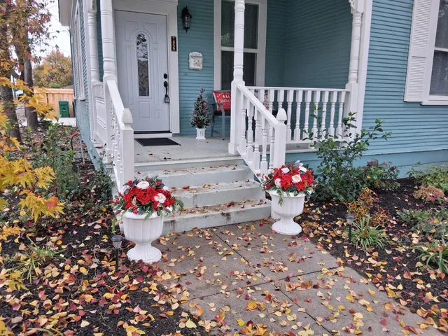 a kitchen with a refrigerator and a stove
