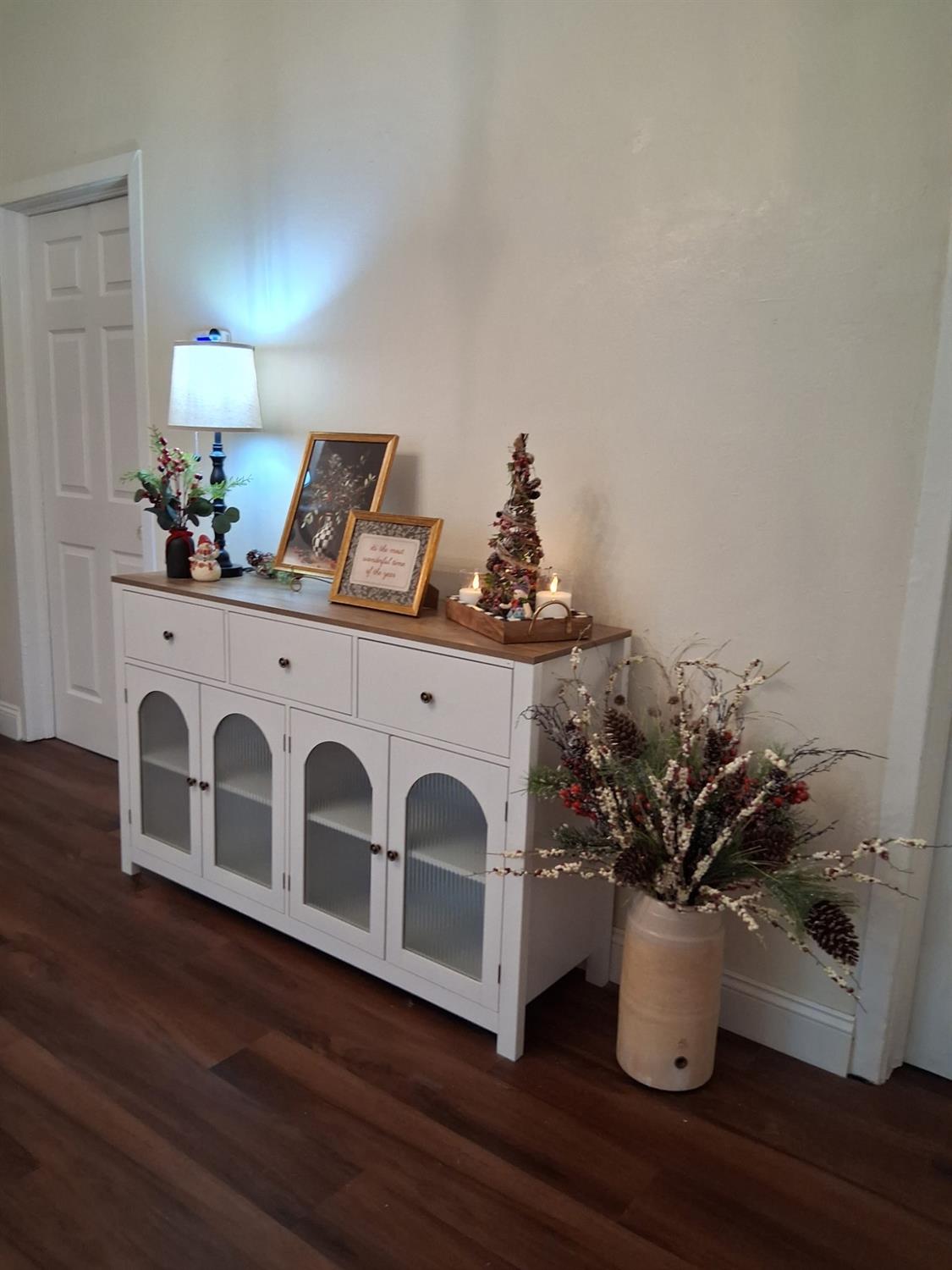 1659 Hazel Street Gridley, CA 95948 - Photo 45 of 70 a white vase with flowers on it a table with a potted plant