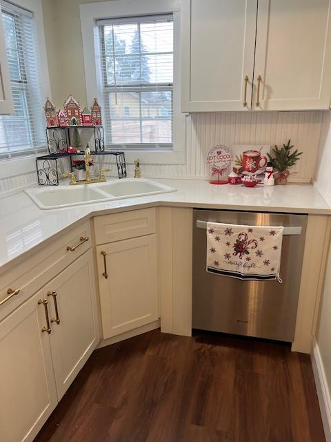 1659 Hazel Street Gridley, CA 95948 - Photo 65 of 70 a kitchen with a sink cabinets and a wooden floor