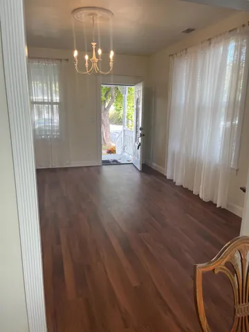 a view of a dining room with furniture