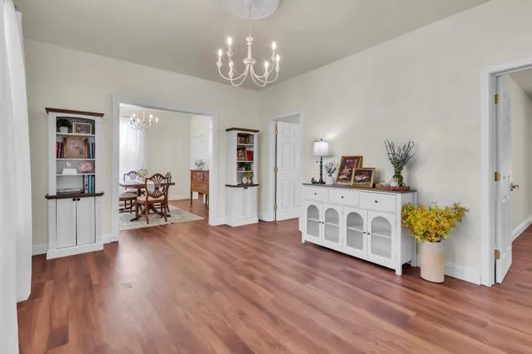 a living room with furniture and a table