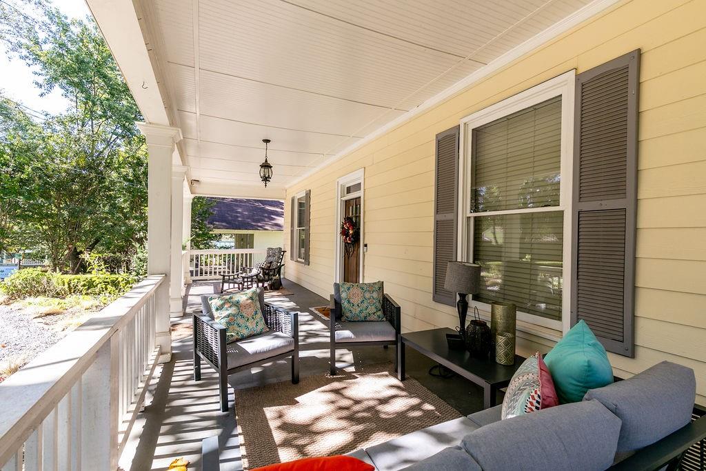 1084 Sanders Avenue Southeast, Unit AB Atlanta, GA 30316 - Photo 13 of 76 a living room with patio furniture and a potted plant