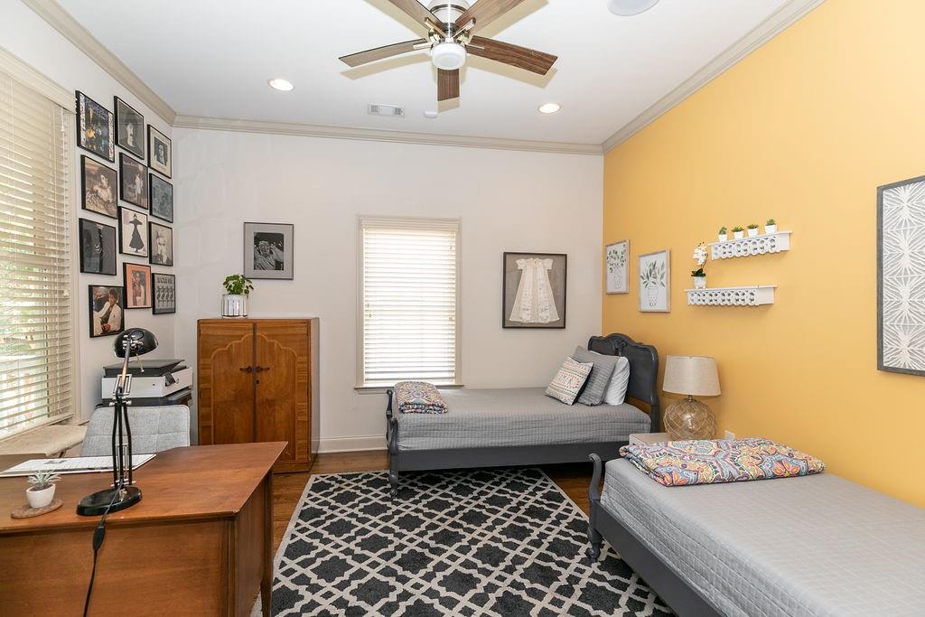 1084 Sanders Avenue Southeast, Unit AB Atlanta, GA 30316 - Photo 34 of 76 a bedroom with a bed and wooden floor