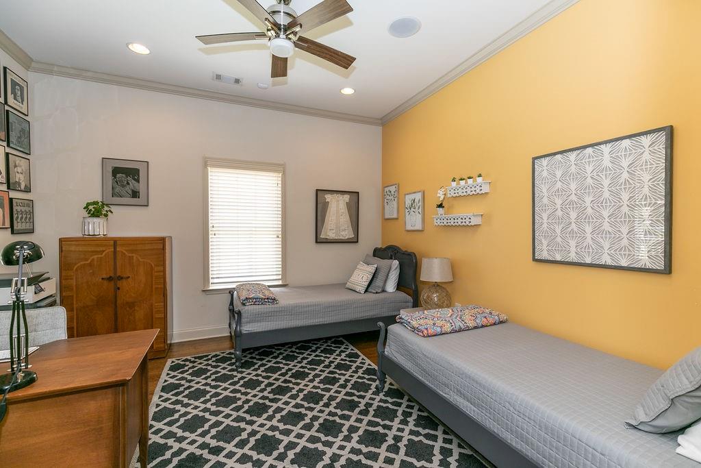 1084 Sanders Avenue Southeast, Unit AB Atlanta, GA 30316 - Photo 38 of 76 a bedroom with furniture and a window