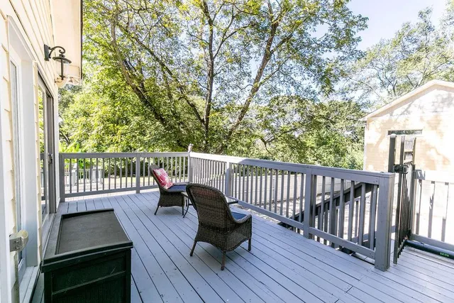a view of a storage and utility room with washer and dryer