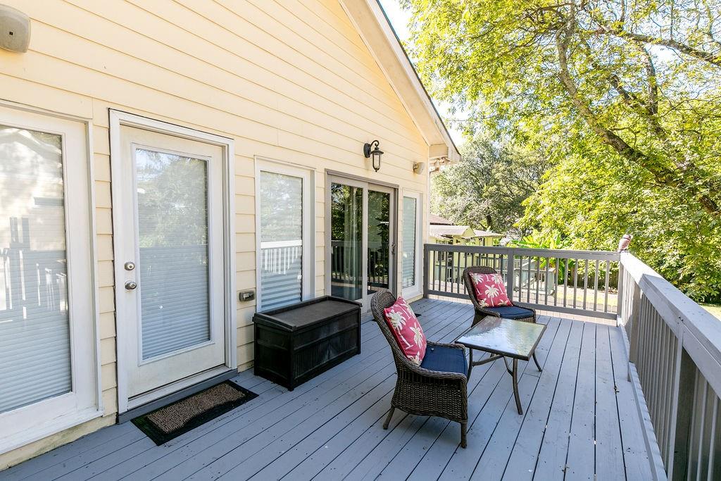 1084 Sanders Avenue Southeast, Unit AB Atlanta, GA 30316 - Photo 49 of 76 a balcony with wooden floor table and chairs