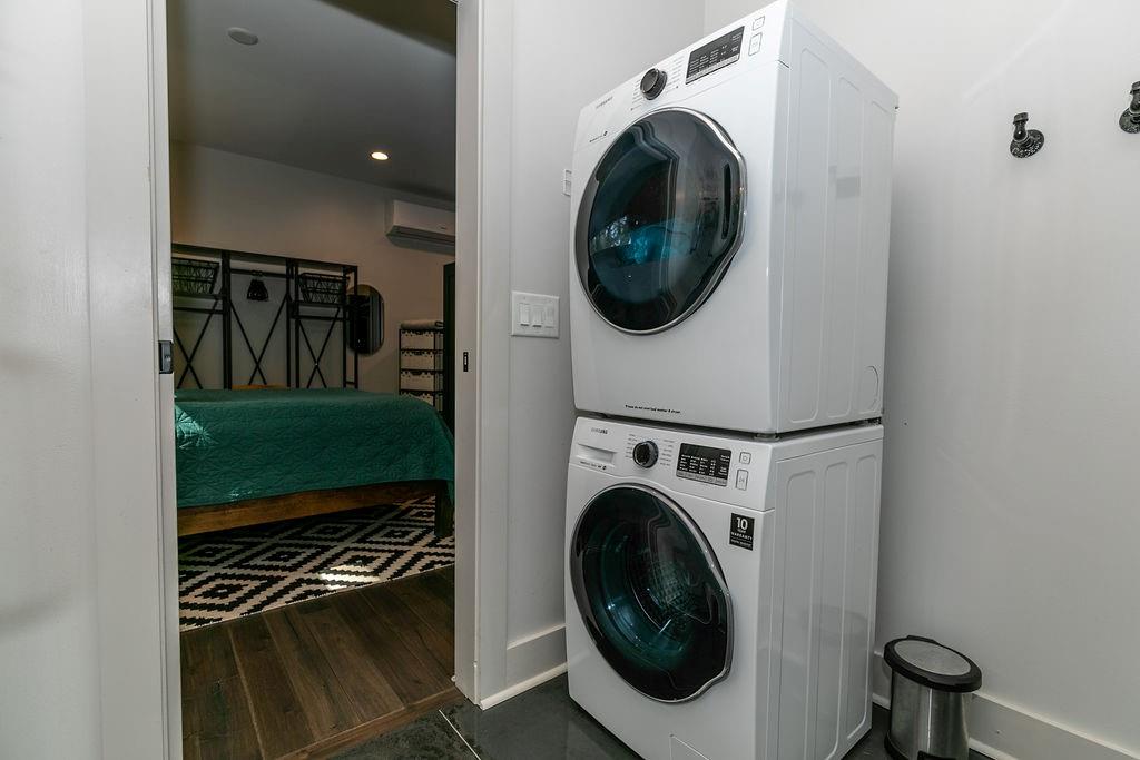 1084 Sanders Avenue Southeast, Unit AB Atlanta, GA 30316 - Photo 71 of 76 a view of a storage and utility room with washer and dryer