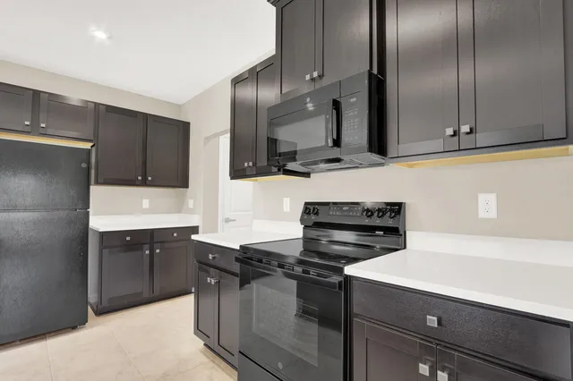 a bathroom with a sink a mirror and vanity
