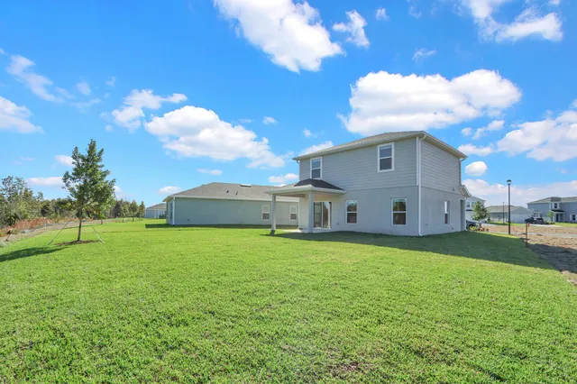 a view of a golf course with a lake