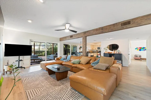 a view of a chairs and table on the balcony