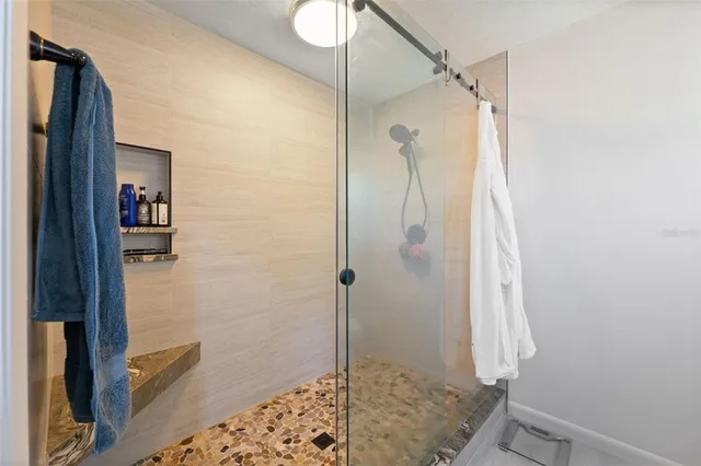 a view of a swimming pool with a patio