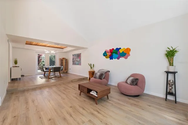 a living room with dining table