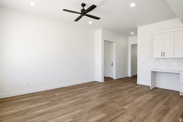 4978 North 75 East Enoch, UT 84721 - Photo 6 of 60 Unfurnished living room with ceiling fan, light wood-style flooring, and recessed lighting
